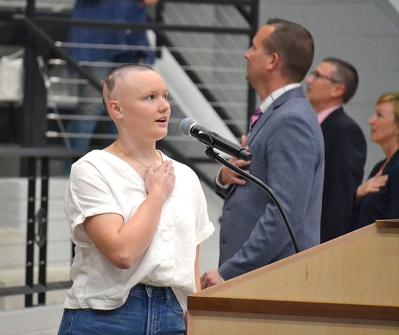 Senior Alison Hiett led fellow seniors, school staff and scholarship presenters in the pledge of alegiance to the American flag to begin the Pea Ridge High School 2021 Scholarship and Academic Award Ceremony Thursday, May 13, in Blackhawk Arena.
