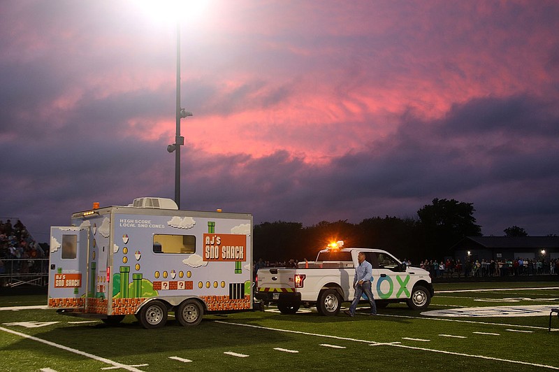 Lincoln High School and Cox Communications surprised graduate A.J. Valdez with this snow cone truck Thursday night following the 2021 commencement ceremony. Principal Stan Karber said the district wanted to present this as a way to give back to Valdez in appreciation for the many ways he brings joy to those around around him. Valdez, who was diagnosed with autism as a young child, was soon giving out free snow cones from "AJ's Snow Shack."