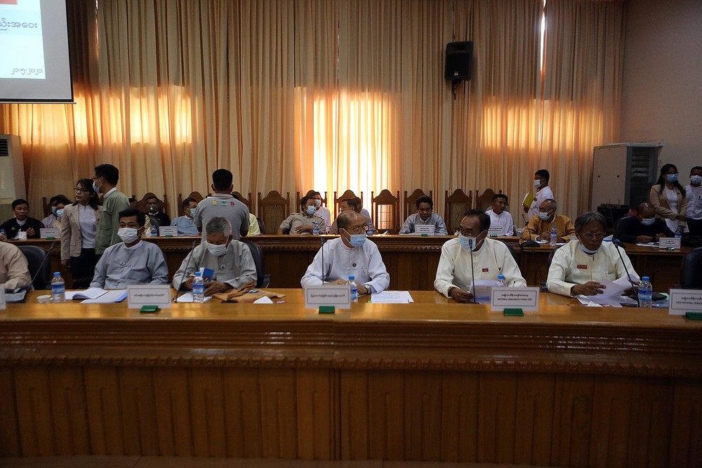 Representatives of various political parties attend a meeting organized by the Union Election Commission Friday, May 21, 2021 in Naypyitaw, Burma. The head of Burma's military-appointed state election commission says his agency will consider dissolving Aung San Suu Kyi's former ruling party for its alleged involvement in electoral fraud and have its leaders charged with treason. (AP Photo)