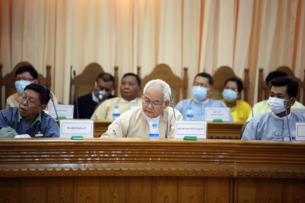 Representatives of various political parties attend a meeting organized by the Union Election Commission Friday, May 21, 2021 in Naypyitaw, Burma. The head of Burma's military-appointed state election commission says his agency will consider dissolving Aung San Suu Kyi's former ruling party for its alleged involvement in electoral fraud and have its leaders charged with treason. (AP Photo)