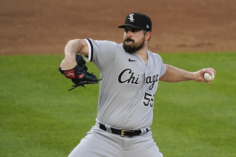 Chicago White Sox's Carlos Rodon winds up during the first inning of the team's baseball game against the New York Yankees on Friday, May 21, 2021, in New York. (AP Photo/Frank Franklin II)