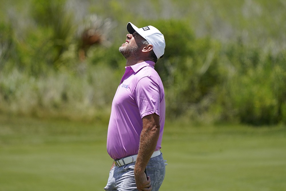 Lee Westwood, of England, reacts after a miss on the fourth green during the third round at the PGA Championship golf tournament on the Ocean Course, Saturday, May 22, 2021, in Kiawah Island, S.C. (AP Photo/Matt York)