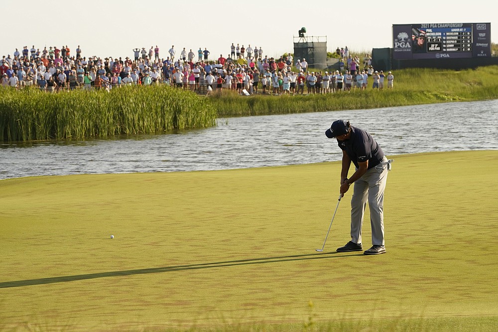 Phil Mickelson works on the 17th hole during the final round at the PGA Championship golf tournament on the Ocean Course, Sunday, May 23, 2021, in Kiawah Island, S.C. (AP Photo/Matt York)