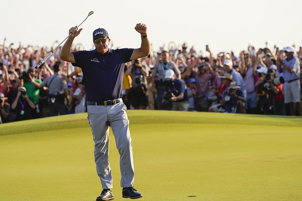 Phil Mickelson celebrates after winning the final round at the PGA Championship golf tournament on the Ocean Course, Sunday, May 23, 2021, in Kiawah Island, S.C. (AP Photo/David J. Phillip)