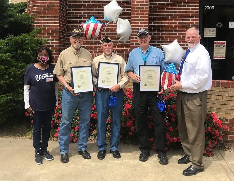 From left, Margaret Robinson recently traveled to Jonesboro to present recognition certificates to Loyd Clark, Wes Westenrieder and Loyd Davis, along with Michael Dobbs, volunteer service chief at the Central Arkansas Veterans Healthcare System. The three drivers transport veterans to Little Rock and the Memphis VAMC two to three days a week. - Submitted photo