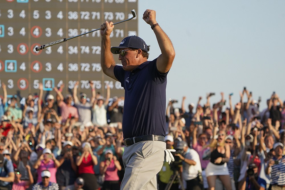 Phil Mickelson celebrates after winning the final round at the PGA Championship golf tournament on the Ocean Course, Sunday, May 23, 2021, in Kiawah Island, S.C. (AP Photo/Chris Carlson)