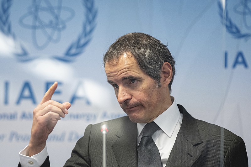 Director General of International Atomic Energy Agency, IAEA, Rafael Mariano Grossi from Argentina, addresses the media during a news conference behind plexiglass shields regarding the agency's monitoring of Irans's nuclear energy program at the International Center in Vienna, Austria, Monday, May 24, 2021. (AP Photo/Florian Schroetter)