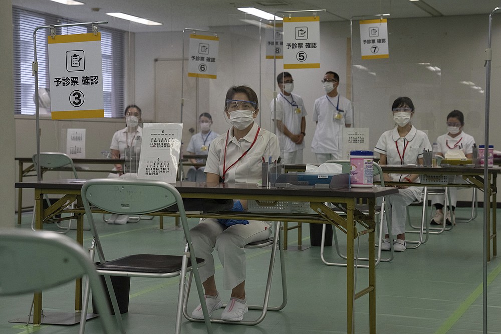 Japan opens mass vaccine centers 2 months before Olympics