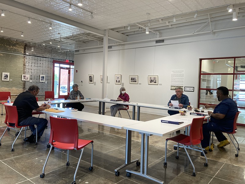 Sheri Storie, (second from left) director of the Advertising and Promotion Commission, tells finance committee members on Monday that April was a record-setting month for tax collections. (Pine Bluff Commercial/Byron Tate)