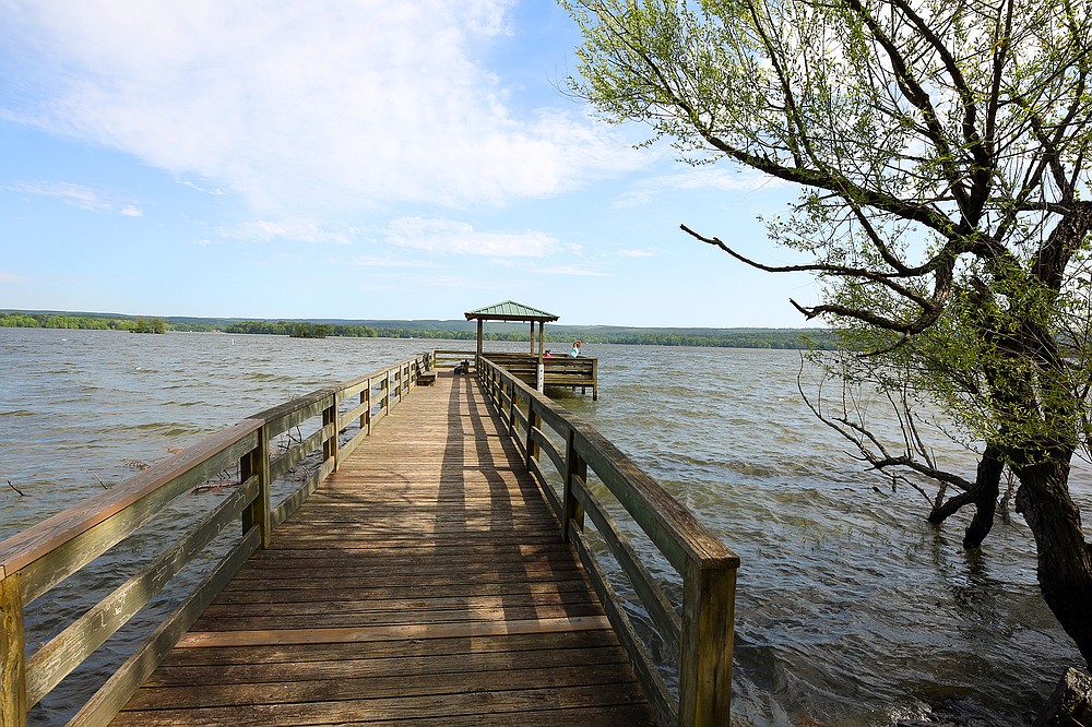 The ADA pier at Harris Brake Lake provides everyone with access to its productive waters. - Photo by Corbet Deary of The Sentinel-Record