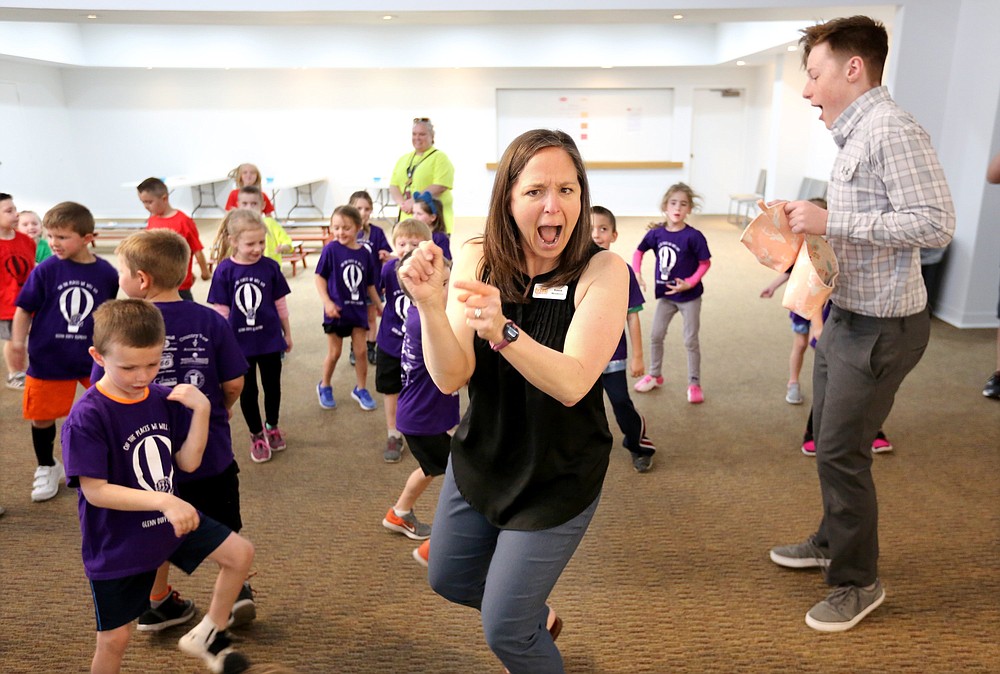 Kassie Misiewicz, founder of Trike Theatre, leads a preshow experience with kindergarten students from Glenn Duffy Elementary School in Gravette. Summer camps at Trike will let children learn about theater from the inside out.
(NWA Democrat-Gazette File Photo/David Gottschalk)