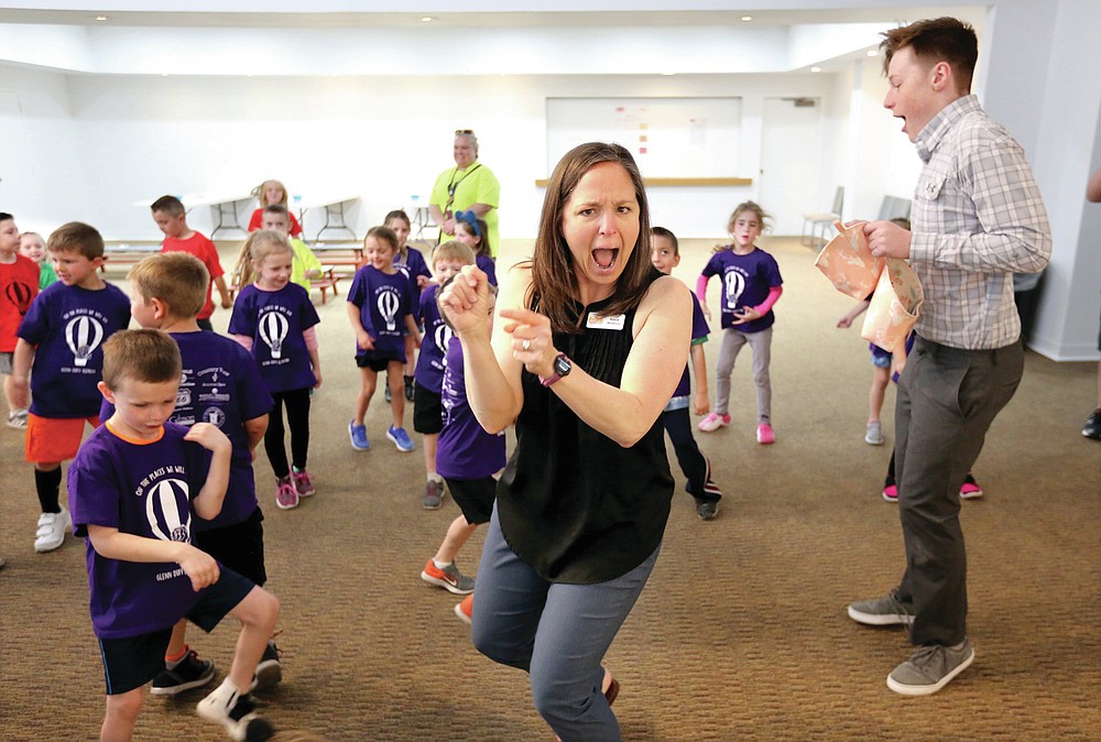 NWA Democrat-Gazette/DAVID GOTTSCHALK Kassie Misiewicz, artistic director and founder of Trike Theatre, leads Wednesday, April 10, 2019, in an Act it Out pre show experience with kindergarten students from Glenn Duffy Elementary School in Gravette, at the Arts Center of the Ozarks in Springdale. The students were at the center to see Balloonacy, part of the Little Trike Series, at the center. The performance continues today through Saturday.