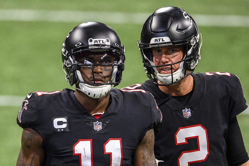 Atlanta Falcons wide receiver Julio Jones (11) walks off the field