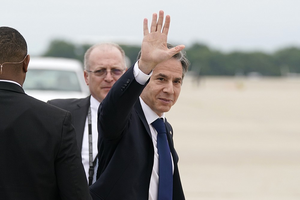 Secretary of State Antony Blinken waves as he departs, Monday, May 24, 2021, at Andrews Air Force Base, Md. Blinken is en route to the Middle East. (AP Photo/Alex Brandon, Pool)