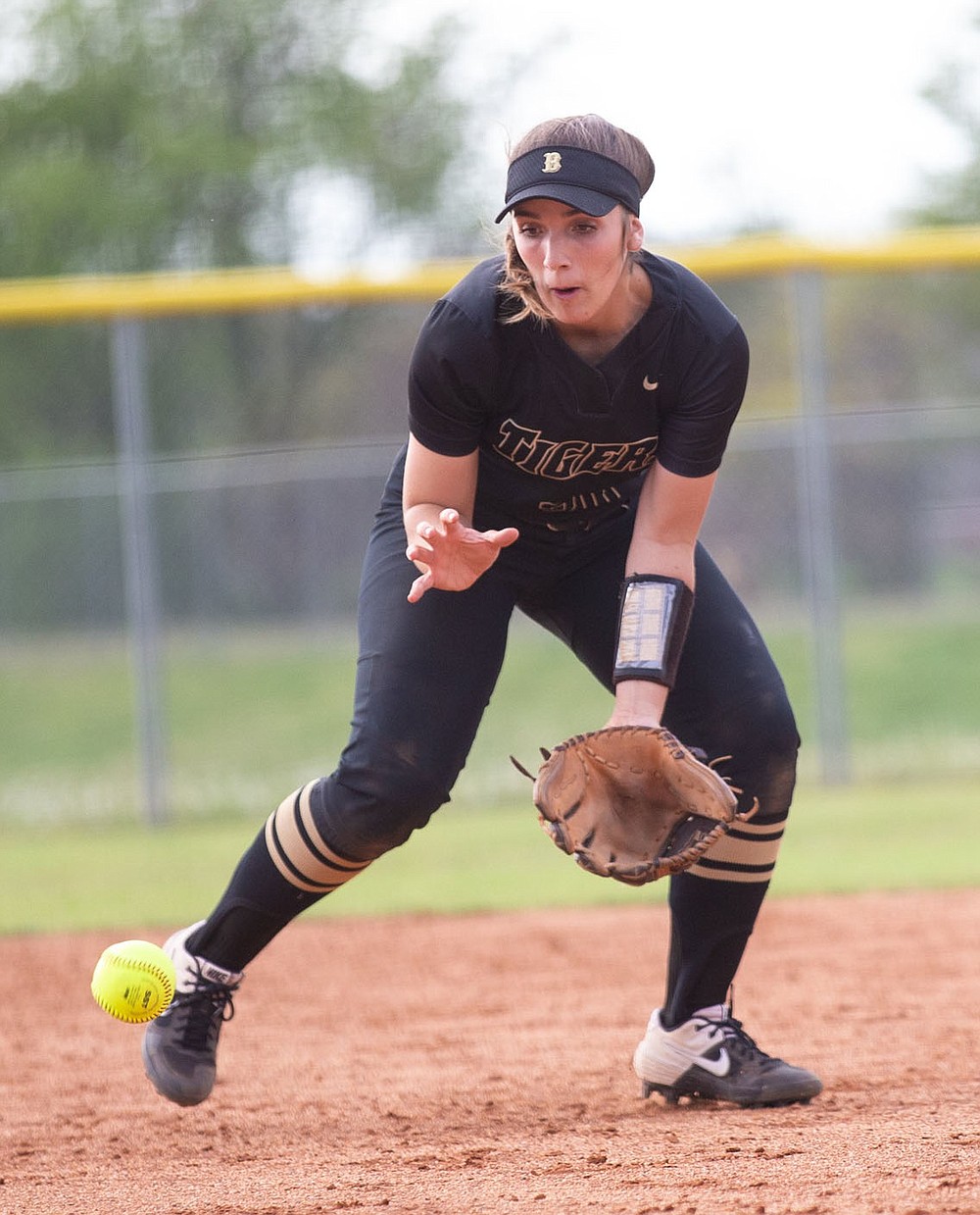 Emily Perry of Bentonville fields the ball in a game at Bentonville West. Perry led the Lady Tigers to the Class 6A state championship and is the All-NWADG Softball Player of the Year.
(Special to NWA Democrat-Gazette David Beach)