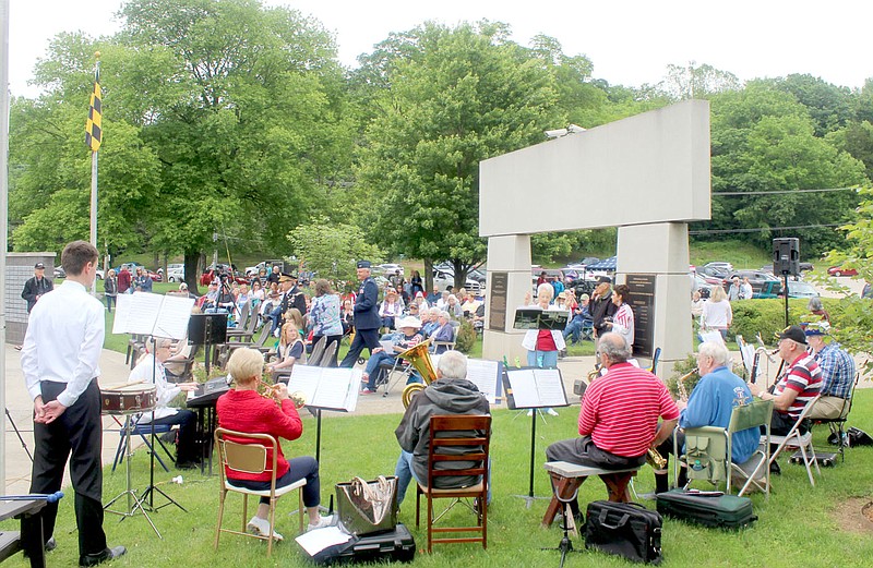 Keith Bryant/The Weekly Vista
The Ecuminical Church Orchestra plays patriotic music as people arrive for a Memorial Day ceremony at the Veterans Wall of Honor Monday, May 31.