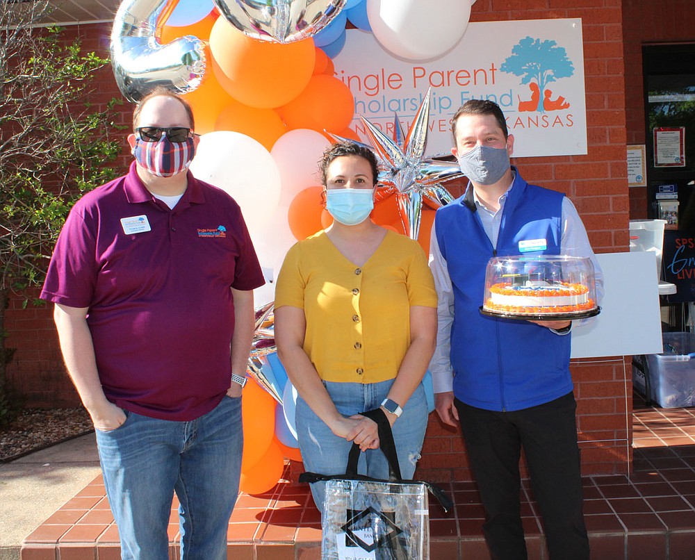 Tyler Clark, SPSF NWA executive director (from left); Berenice (cq) Monsivais, 2021 graduate; and Stan Rodgers, board member, visit at the group's May 5 graduation celebration.
(NWA Democrat-Gazette/Carin Schoppmeyer)