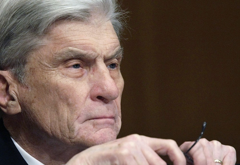 ** FILE ** In this April 8, 2008 file photo, then Senate Armed Services Committee member Sen. John Warner, R-Va., listens to testimony on Capitol Hill in Washington. Warner, a former Navy secretary and one of the Senate’s most influential military experts, has died at 94. (AP Photo/Pablo Martinez Monsivais, File)