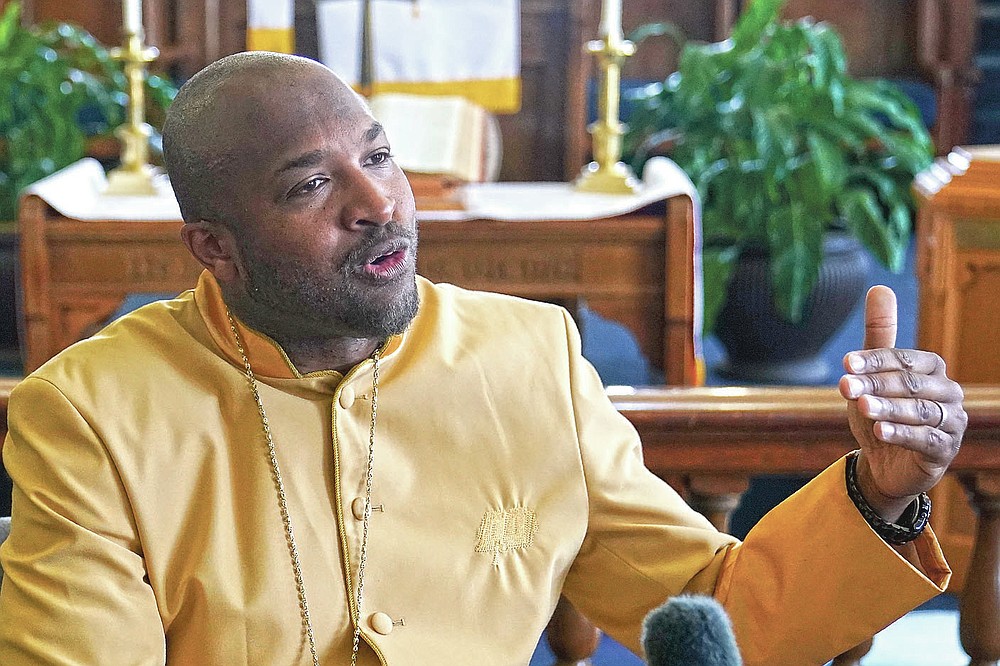 The Rev. Robert Turner, pastor of the Historic Vernon African Methodist Episcopal Church, speaks during an interview at the church in Tulsa, Okla., on Sunday, April 11, 2021. Speaking about the 1921 Tulsa Race Massacre, he says, “What happened in Tulsa wasn’t just unique to Tulsa. This happened all over the country. It was just that Tulsa was the largest. It damaged our community. And we haven’t rebounded since. I think it’s past time that justice be done to atone for that.” (AP Photo/Sue Ogrocki)
