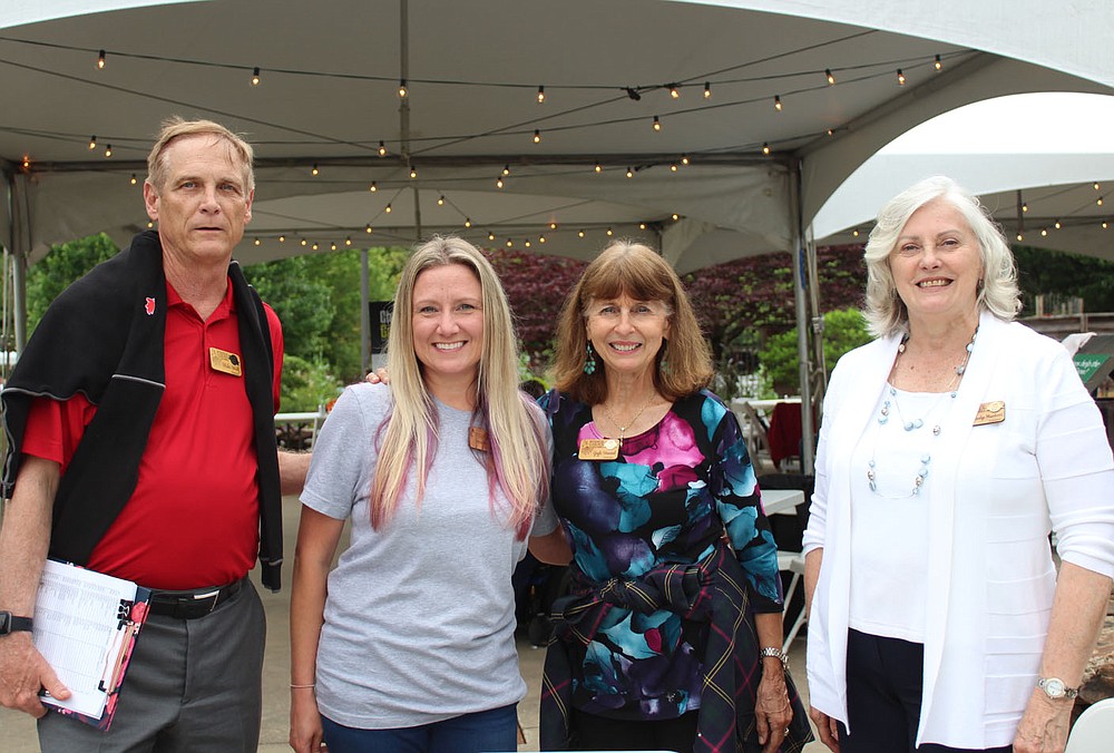 Mike Wulf, Heather Silva, Gayle Howard and Marilyn Misenhimer, Botanical Garden of the Ozarks volunteers, welcomed guests to the fundraiser May 25.
(NWA Democrat-Gazette/Carin Schoppmeyer)