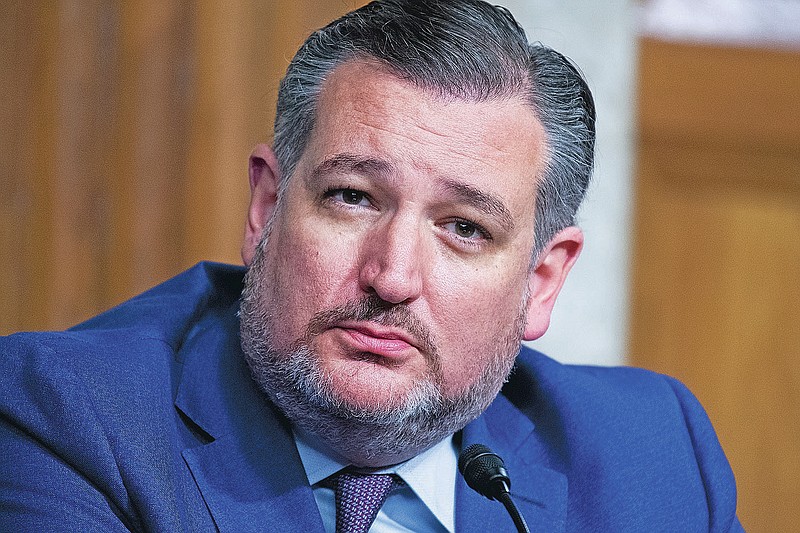 FILE - In this April 28, 2021 file photo, Sen. Ted Cruz, R-Texas, listens during the the Senate Judiciary Committee confirmation hearing in Dirksen Senate Office Building in Washington. On Friday, May 28, 2021, The Associated Press reported on stories circulating online incorrectly asserting that a video shows Cruz swallowing a fly during a Fox News interview. On June 27, 2019, Cruz, a Republican, appeared on the Fox News show “Hannity,” but there was no insect in the original clip. (Tom Williams/Pool via AP, File)