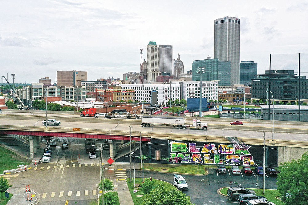 Interstate 244 straddles Greenwood Avenue in Tulsa, Okla., on Monday, May 24, 2021. The highway bisects the neighborhood and separates the Greenwood area from downtown Tulsa. (AP Photo/Sue Ogrocki)