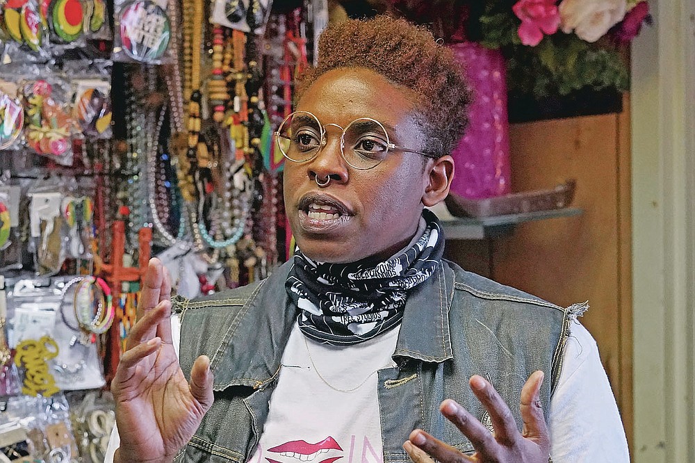 Artist Dawn Tree speaks during an interview at the Black Wall Street Market in Tulsa, Okla., on Saturday, April 10, 2021. “There’s trauma that’s blanketed over this city,” says Tree of 1921's Tulsa Race Massacre. “Going forward, whatever is done to atone for what happened 100 years ago must be done for the north side community.” (AP Photo/Sue Ogrocki)
