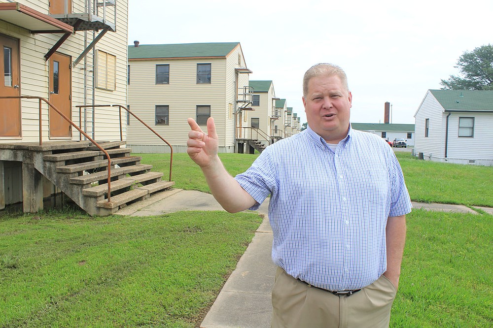 Fort Chaffee Redevelopment Authority Director Daniel Mann discusses the renovation of the Buckhorn Street Barracks for residential and commercial spaces on Thursday, May 27, 2021 in Fort Chaffee.