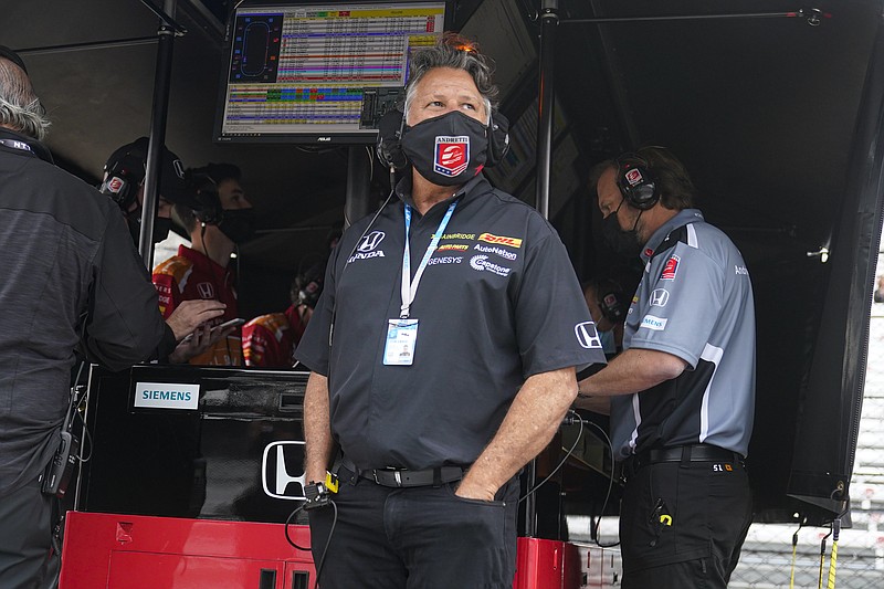 Car owner Michael Andretti watches from the pit area during practice for the Indianapolis 500 auto race at Indianapolis Motor Speedway in Indianapolis, Tuesday, May 18, 2021. (AP Photo/Michael Conroy)