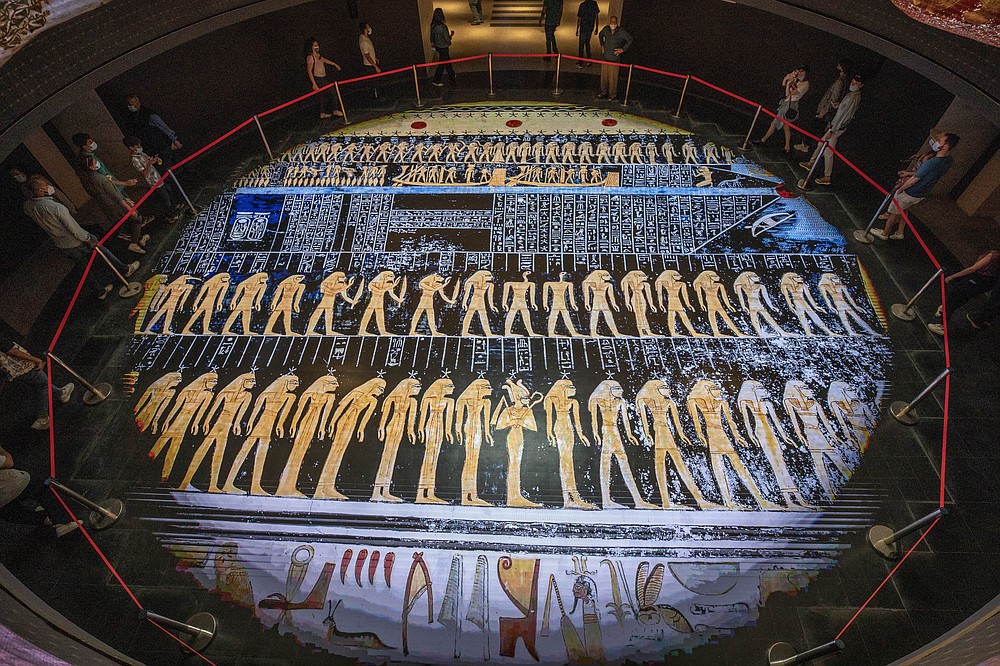 FILE - In this April 24, 2021 file photo, people visit the new National Museum of Egyptian Civilization in Old Cairo, Saturday, April 24, 2021.
As some European countries re-open to international tourists, Egypt has already been trying for months to attract them to its archaeological sites and museums. Officials are betting that the new ancient discoveries will set it apart on the mid- and post-pandemic tourism market (AP Photo/Nariman El-Mofty, File)