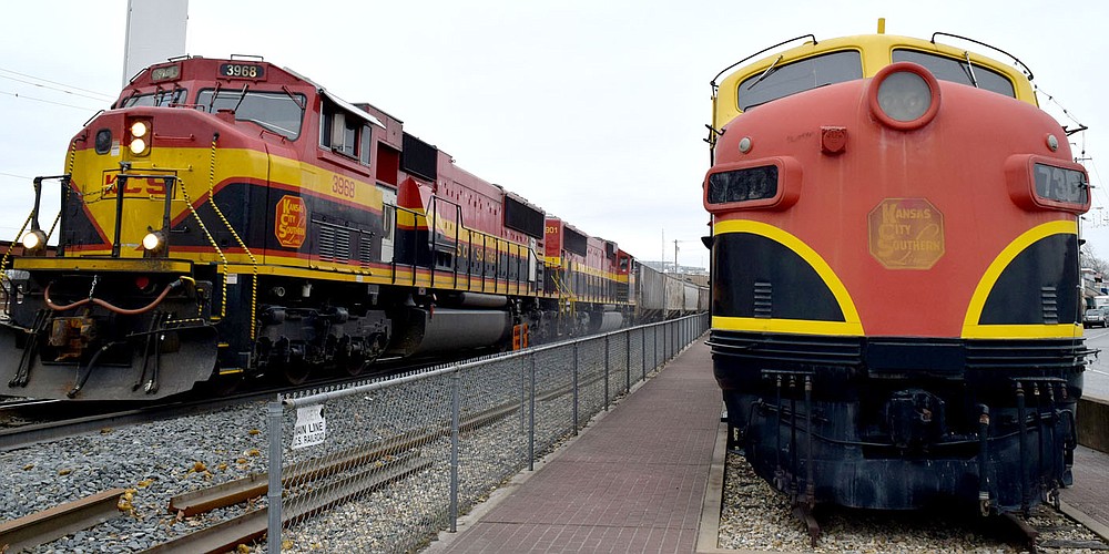 Westside Eagle Observer/MIKE ECKELS
The old and the fairly new. A Kansas City Southern EMD SD70MAC (left), built in 2000 powers past a 1950 EMD F7A locomotive on permeant display at the depot in Decatur January 26, 2018. The history of the Kansas City Railroad dated to 1887 when Arthur Stillwell founded the Kansas City Suburban Belt Railway.