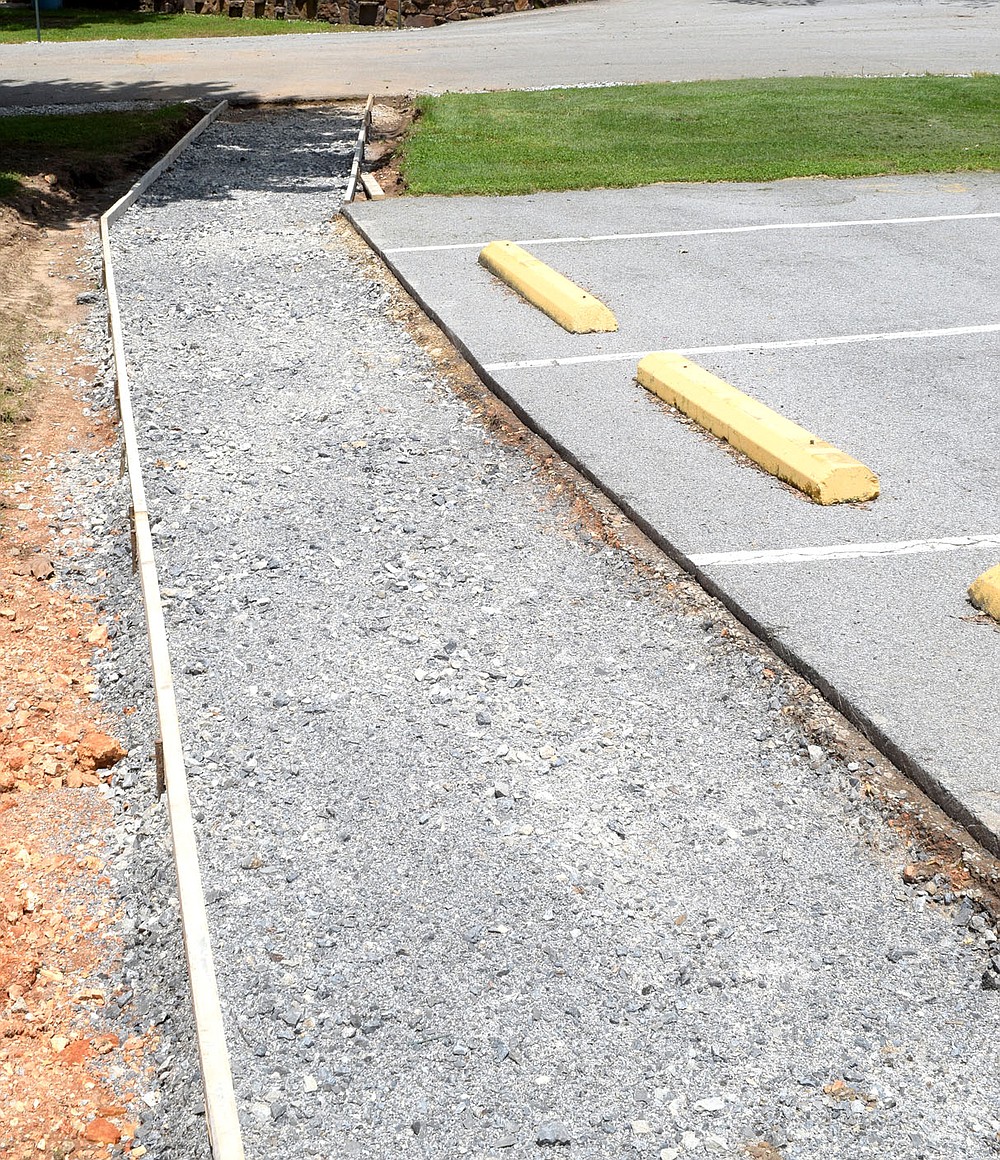 Westside Eagle Observer/MIKE ECKELS
A new sidewalk leading from the Bunker to Pat Streets awaits concrete fill at Veteran Park in Decatur Thursday afternoon. Once this walkway is complete it will provide better handicap accessibility to the Bunker during events such as the Decatur Barbecue.