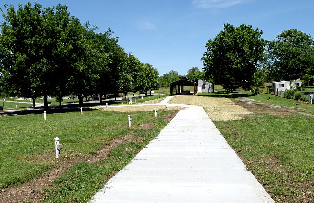 Westside Eagle Observer/MIKE ECKELS
Part of the new Veterans Park Walking Trail is ready for use May 28. This section of trail ties the western part of the loop to the quarter mile track near the Veterans Memorial.