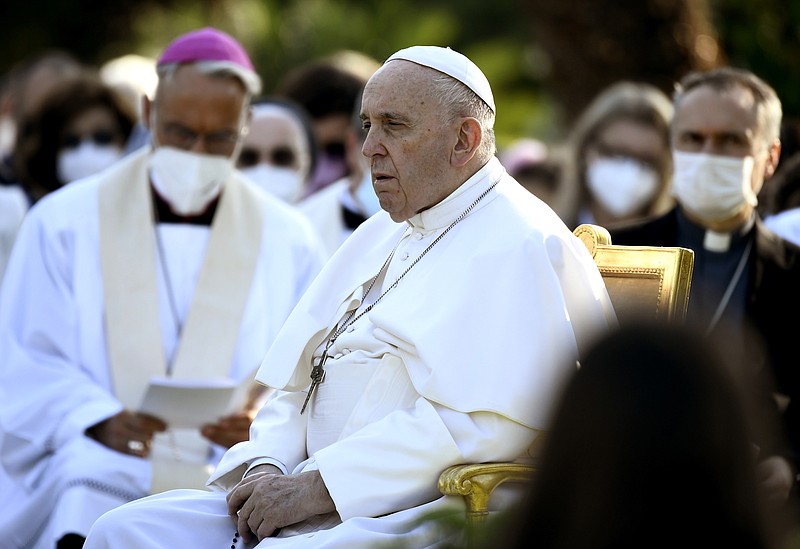 Pope Francis leads the prayer to mark the end of the month of worldwide prayers to stop the pandemic in the Vatican gardens Monday, May 31, 2021 (Filippo Monteforte/Pool photo via AP)