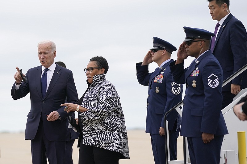 President Joe Biden walks with Housing and Urban Development Secretary Marcia Fudge as he arrives in Tulsa, Okla., Tuesday, June 1, 2021. (AP Photo/Evan Vucci)