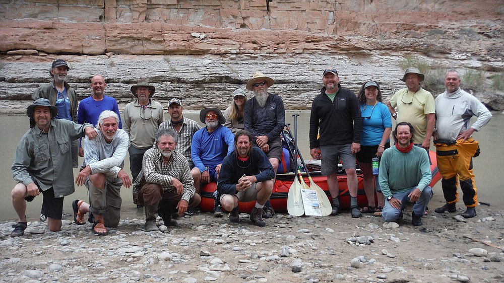 David Gottschalk (front row from left), Bob Kramer, John Bailey, Ryan Wise, Patrick Davis and Bob Walsh (back row from left),Eric McMillan, Bobby Cox, Mark Weathers, Debbie and Danny Stillwell, Chris Patrick, Amanda Harris, Dan Held and Jeff Jackson pause for a photograph before putting in at Honaker Campground on the San Juan River in southeast Utah.
(NWA Democrat-Gazette/David Gottschalk)