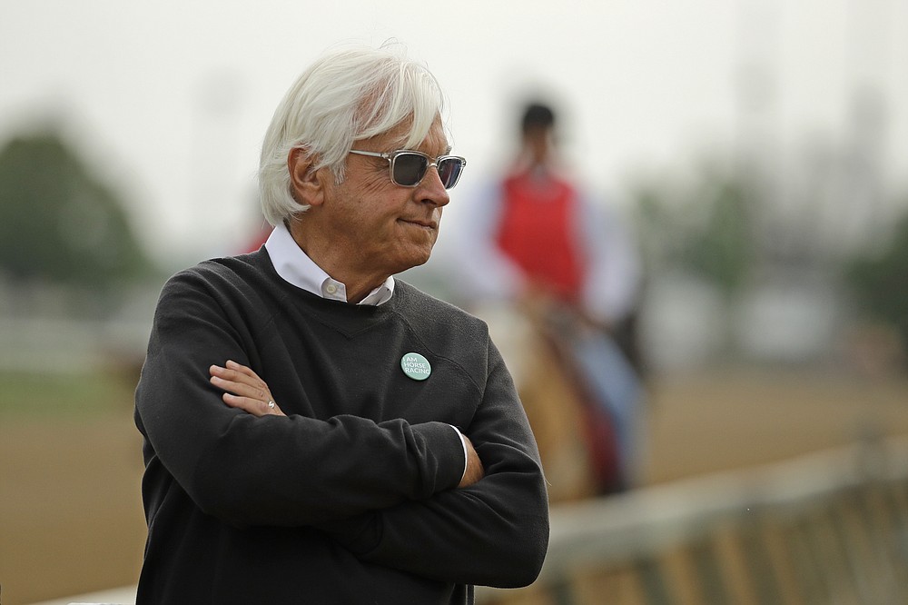 FILE - In this May 1, 2019, file photo, trainer Bob Baffert watches his Kentucky Derby entrant Game Winner during a workout at Churchill Downs in Louisville, Ky. Baffert’s lawyer said Wednesday, June 2, 2021, that a split-sample test of Kentucky Derby winner Medina Spirit came back positive for the presence of the steroid betamethasone, which could lead to the horse’s disqualification and discipline for the Hall of Fame trainer. (AP Photo/Charlie Riedel, File)