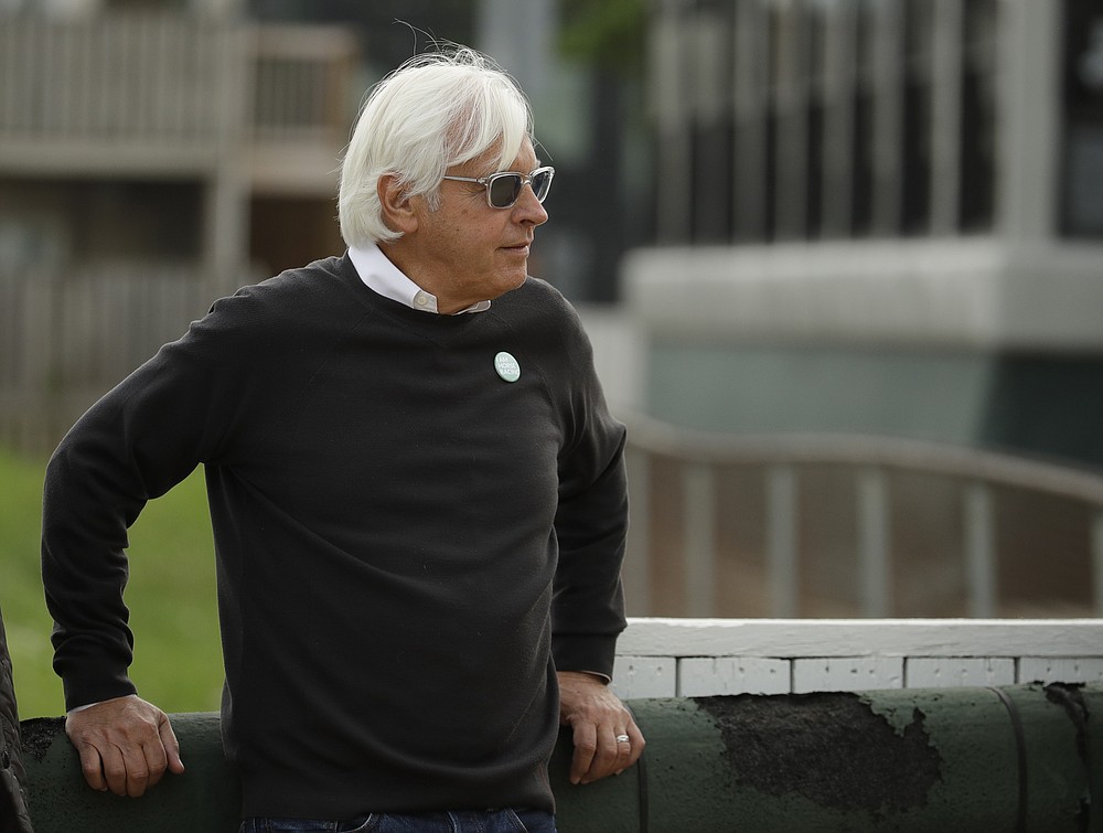 FILE - In this May 1, 2019, file photo, Trainer Bob Baffert watches his Kentucky Derby entrant Game Winner during a workout at Churchill Downs in Louisville, Ky. Baffert was suspended for two years by Churchill Downs on Wednesday, Mune 2, 2021, after an additional drug test of Medina Spirit confirmed the presence of the steroid betamethasone in the Kentucky Derby winner’s system. (AP Photo/Charlie Riedel, File)