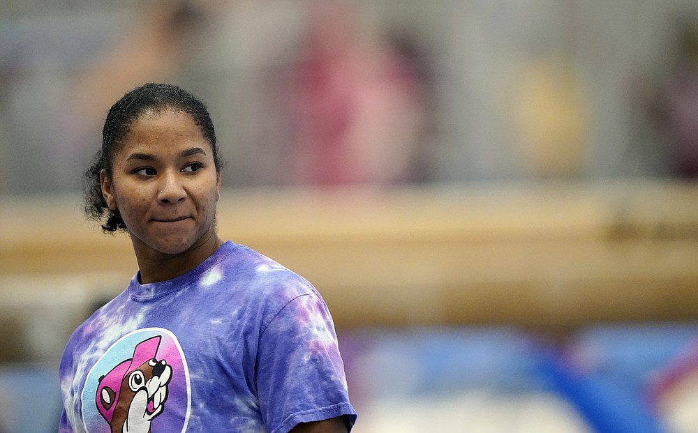 FILE - In this May 11, 2021, file photo, gymnast Jordan Chiles trains in Spring, Texas. Three years ago, Jordan Chiles wasn't sure she wanted to be a gymnast anymore. A move to Texas, a dash of maturity and a renewed confidence in herself have the 20-year-old on the cusp of earning a spot on the U.S. Olympic team. (AP Photo/David J. Phillip, File)