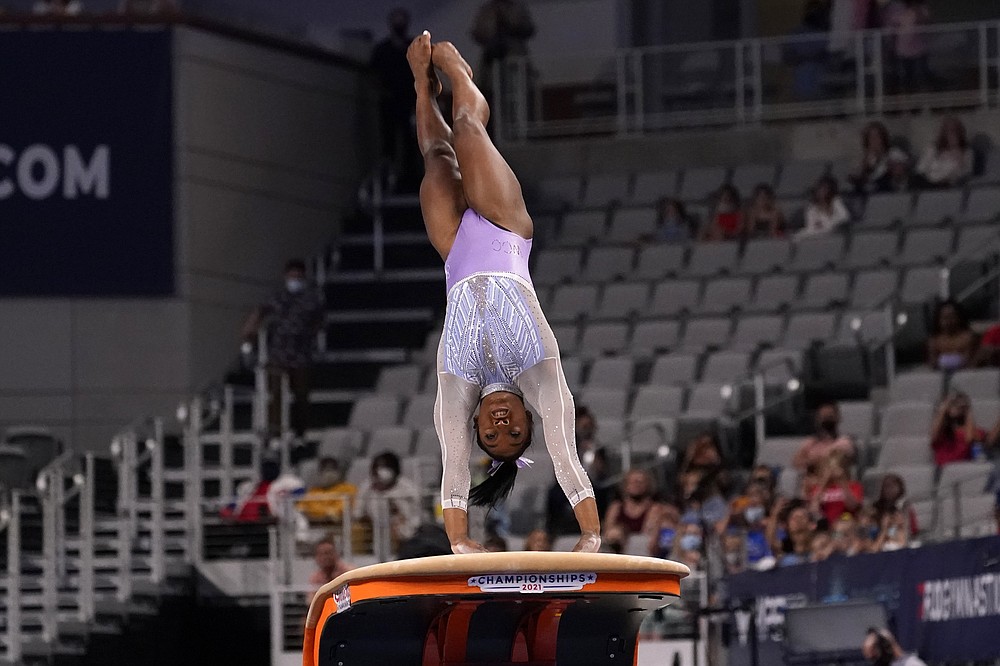 Biles polishes act, in control at Championships