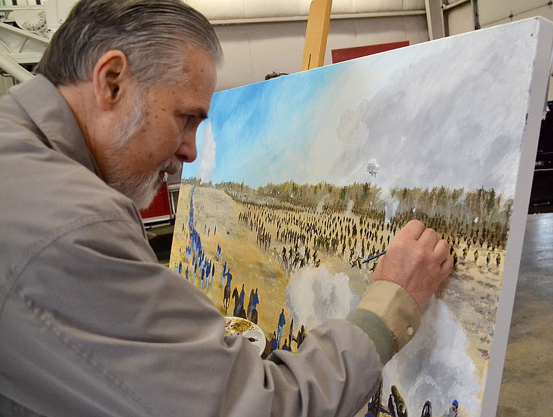 Dan Hoffbauer adds a few details to his painting of a scene of the Battle of Pea Ridge. Hoffbauer had a few of his paintings on display at the Pea Ridge Fire Department pancake breakfast Saturday, May 29, 2021.