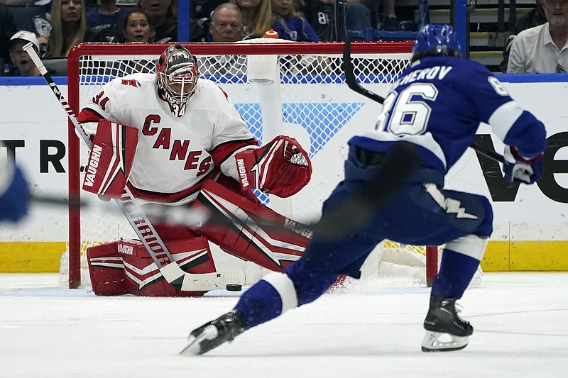 Carolina Hurricanes goaltender Petr Mrazek (34) can't stop a goal by Tampa Bay Lightning right wing Nikita Kucherov during the third period in Game 4 of an NHL hockey Stanley Cup second-round playoff series Saturday, June 5, 2021, in Tampa, Fla. (AP Photo/Chris O'Meara)