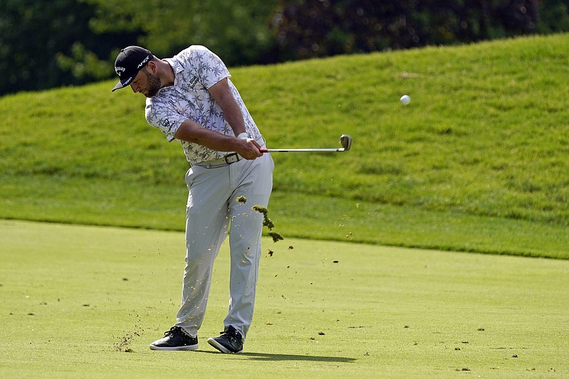 Jon Rahm hits to the 13th green during the third round of the Memorial golf tournament, Saturday, June 5, 2021, in Dublin, Ohio. (AP Photo/Darron Cummings)