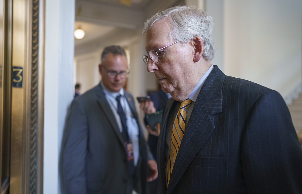 Senate Minority Leader Mitch McConnell, R-Ky., leaves a GOP lunch without speaking to reporters as senators rush to the chamber for votes ahead of the approaching Memorial Day recess, at the Capitol in Washington, Wednesday, May 26, 2021. Lawmakers still face standoffs on an infrastructure bill, police reform, voting rights, and a bipartisan commission to investigate the Jan. 6 attack on the Capitol. (AP Photo/J. Scott Applewhite)
