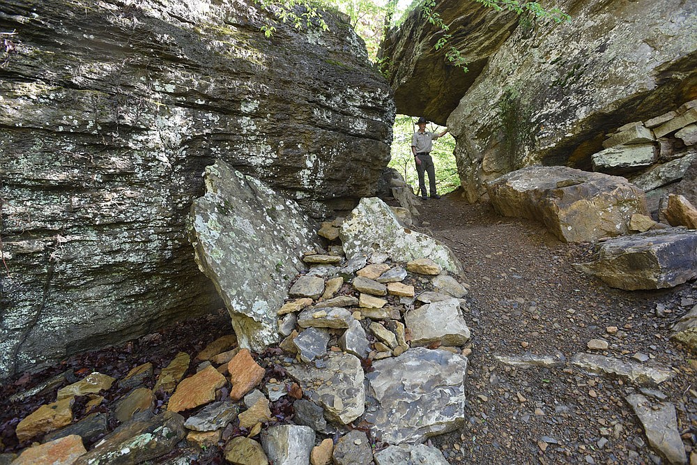 Scott pauses at a keyhole feature on part of the new Monument Trails.
(NWA Democrat-Gazette/Flip Putthoff)