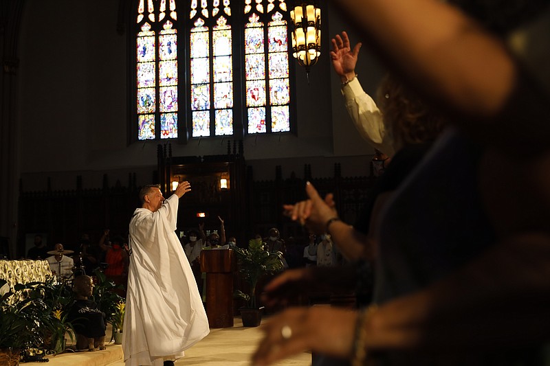 Cleared, priest returns to pulpit The Arkansas DemocratGazette