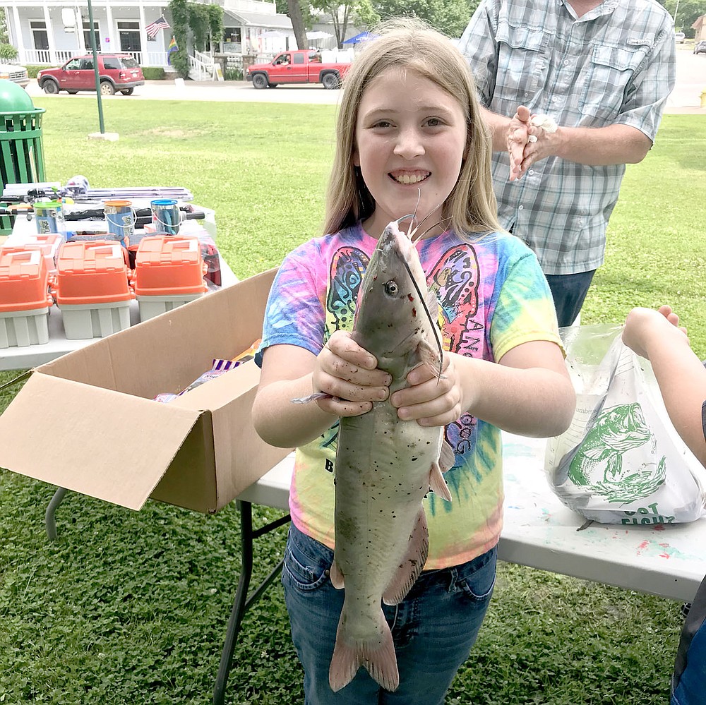 Photo submitted Esther Baker won the 7-12 year old girls category for largest fish with this 2 lb., 14 oz. catfish caught during Saturday’s fishing derby.