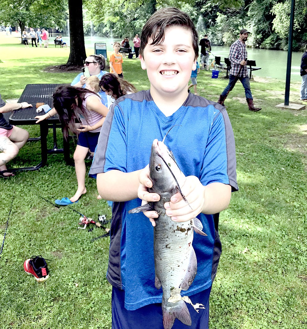Photo Submitted Stephen Baker won 7-12 year old boys category for largest fish with this catfish that weighed over 2 lbs. at Saturday’s fishing derby.