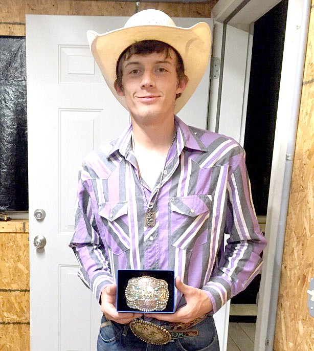 Photo Submitted Colcord native Dason Janes won the bullring event with an overall score of 86 at the Concord Rodeo on Saturday. The buckle that Janes and the participants in other events won were donated by the Cripps family in memory of Greg Cripps.