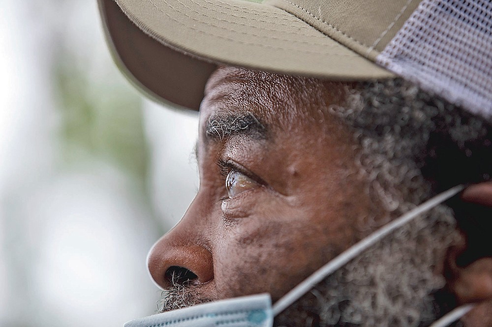 Dozens of Black farmers gather in Byromville, Ga., on Tuesday, May 4, 2021, to hear U.S. Sen. Rev. Raphael Warnock detail the federal COVID-19 relief coming to them and voice concerns of the history of discrimination against them at the hands of the United States Department of Agriculture. (Riley Bunch/The Daily Times via AP)